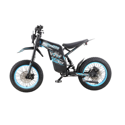 Blue Buzymoto DAT70 electric dirt bike with fat tires, pedal drivetrain, and full suspension shown in side profile on a white background.