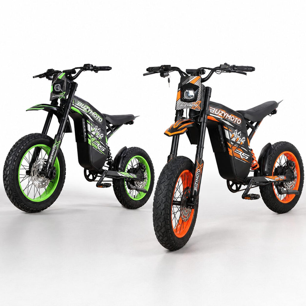 Green and orange Buzymoto DAT70 electric bikes displayed side by side on a clean white studio background.